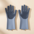 Gray silicone grooming gloves for dogs on beige background
