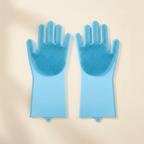 Blue silicone grooming gloves for dogs on beige background