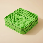 5 green silicone lick mats stacked
