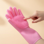 Close up of soft silicone bristles on pink grooming glove